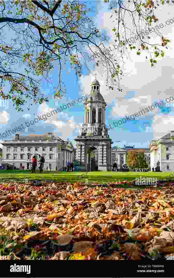 A Panoramic View Of Dublin's Iconic Trinity College, Featuring The Campanile And Cricket Field, Under A Clear Blue Sky, Surrounded By Lush Greenery. Fodor S Essential Ireland 2024 (Full Color Travel Guide)