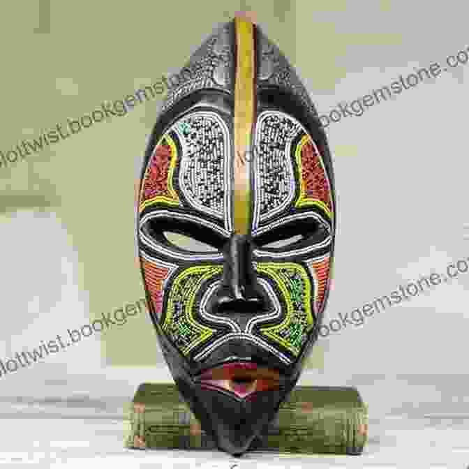 Intricately Carved Wooden Mask Adorned With Feathers And Beads, Representing A Mythical Figure From An Indigenous Culture Black Art: A Cultural History (Third) (World Of Art)